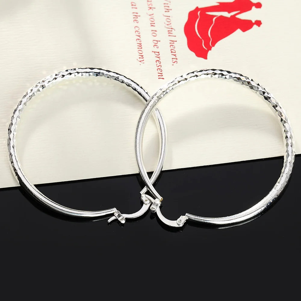 Boucle d'oreille créole en argent pour femme