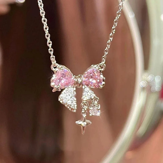 Collier noeud rose pour femme